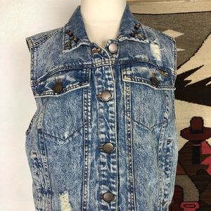 Distressed denim vest w/ crocheted skull